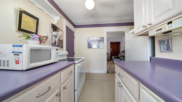 215 E 3rd St, Byron, IL 61010 - kitchen featuring white appliances and white cabinetry