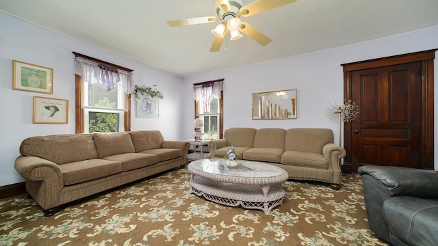 215 E 3rd St, Byron, IL 61010 - living room featuring a ceiling fan