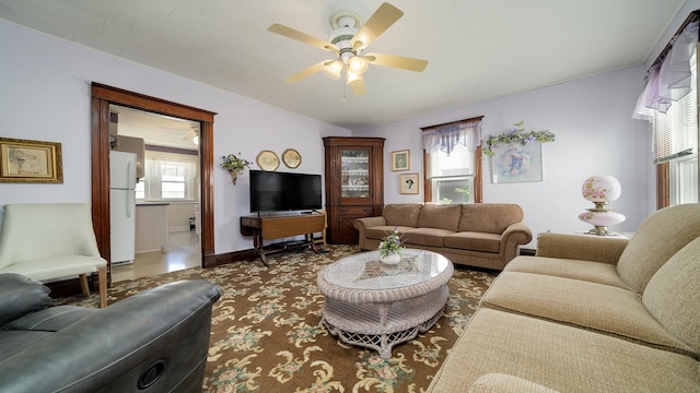 215 E 3rd St, Byron, IL 61010 - living room with ceiling fan