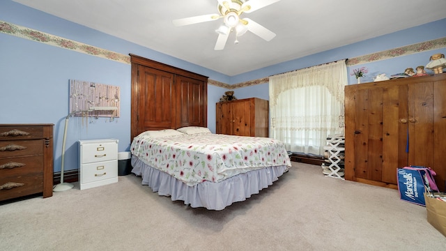 215 E 3rd St, Byron, IL 61010 - bedroom featuring light colored carpet and ceiling fan