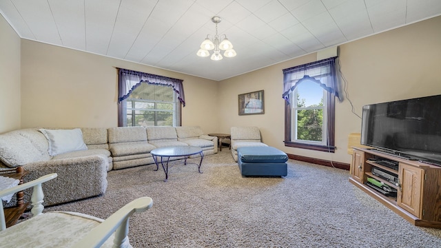 215 E 3rd St, Byron, IL 61010 - carpeted living area with a chandelier
