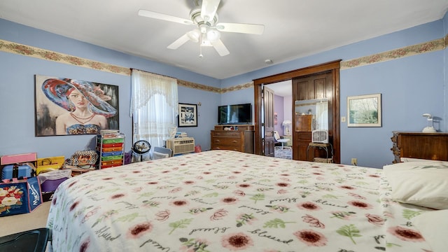 215 E 3rd St, Byron, IL 61010 - carpeted bedroom with a ceiling fan