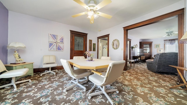 215 E 3rd St, Byron, IL 61010 - dining room featuring carpet and ceiling fan