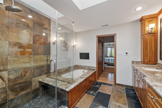 9901 Mission, Palos Park, IL 60464 - bathroom featuring vanity, ensuite bath, a garden tub, a stall shower, and recessed lighting