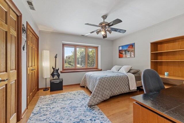 9901 Mission, Palos Park, IL 60464 - bedroom featuring light wood finished floors, an office area, and ceiling fan