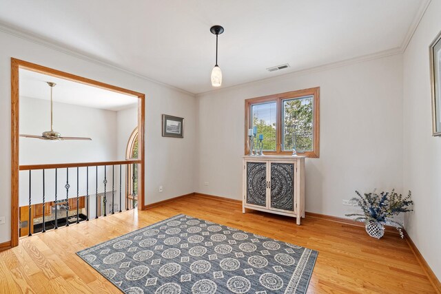 9901 Mission, Palos Park, IL 60464 - unfurnished room with wood finished floors, crown molding, and ceiling fan