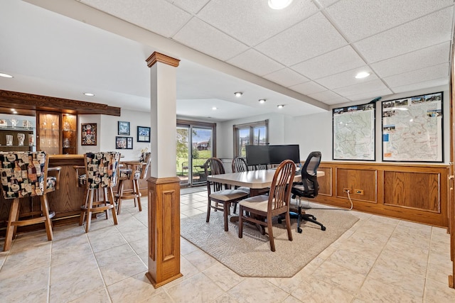 9901 Mission, Palos Park, IL 60464 - office featuring a wainscoted wall, a paneled ceiling, recessed lighting, a dry bar, and decorative columns