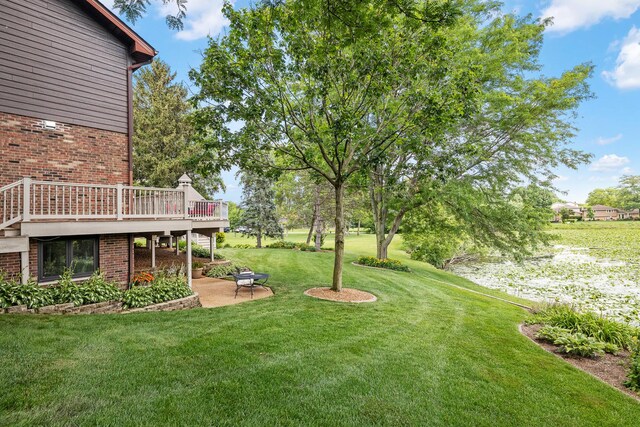 9901 Mission, Palos Park, IL 60464 - view of grassy yard with a deck and a patio area