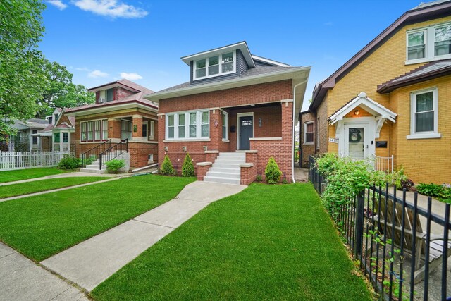 5426 N Bernard St, Chicago, IL 60625 - bungalow featuring a shingled roof and brick siding
