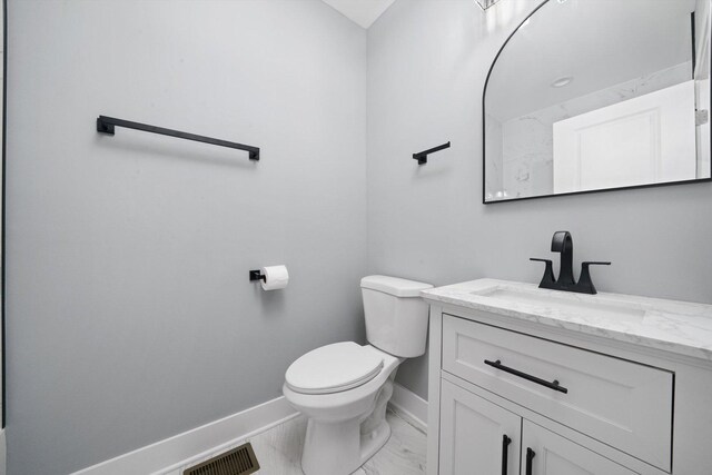 5426 N Bernard St, Chicago, IL 60625 - bathroom with marble look tiles and vanity