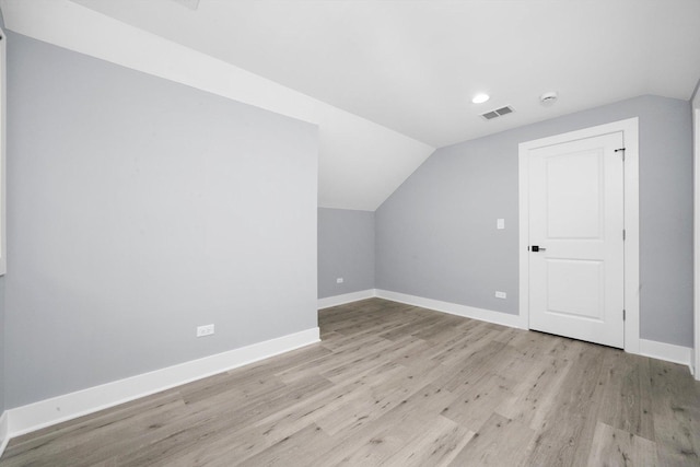 5426 N Bernard St, Chicago, IL 60625 - bonus room featuring vaulted ceiling, light wood-style flooring, and recessed lighting