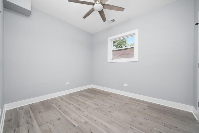 5426 N Bernard St, Chicago, IL 60625 - spare room featuring light wood finished floors, a ceiling fan, and vaulted ceiling