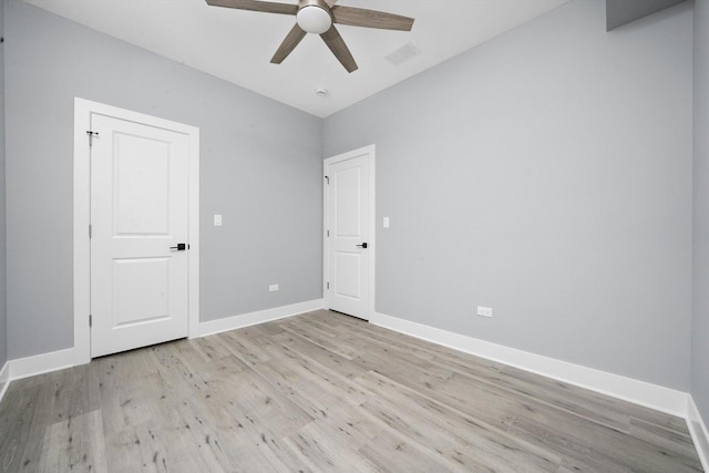 5426 N Bernard St, Chicago, IL 60625 - unfurnished bedroom featuring light wood finished floors and ceiling fan