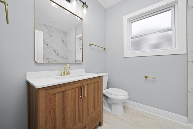 5426 N Bernard St, Chicago, IL 60625 - bathroom featuring vanity and wood finish floors