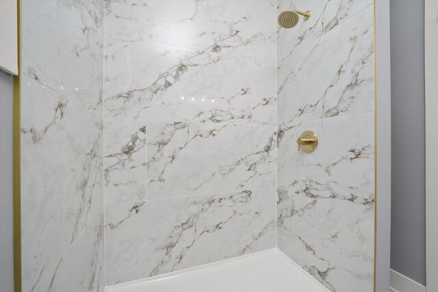 5426 N Bernard St, Chicago, IL 60625 - bathroom featuring a marble finish shower