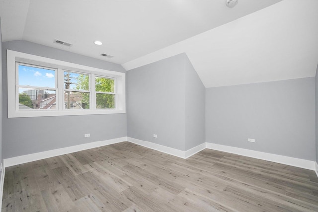 5426 N Bernard St, Chicago, IL 60625 - additional living space with lofted ceiling, light wood-style flooring, and recessed lighting