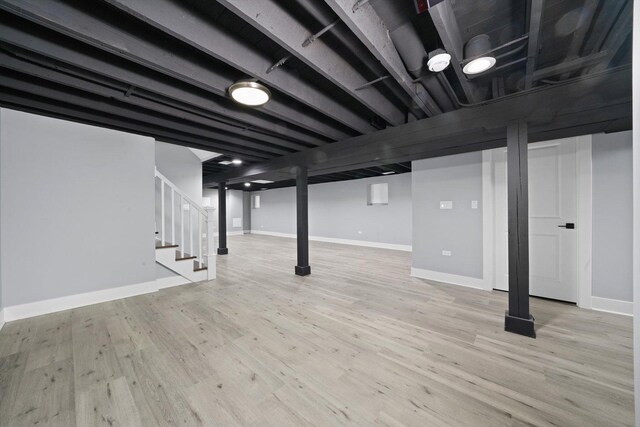 5426 N Bernard St, Chicago, IL 60625 - finished below grade area with stairs and wood finished floors