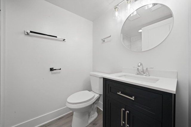5426 N Bernard St, Chicago, IL 60625 - half bathroom with vanity and wood finished floors