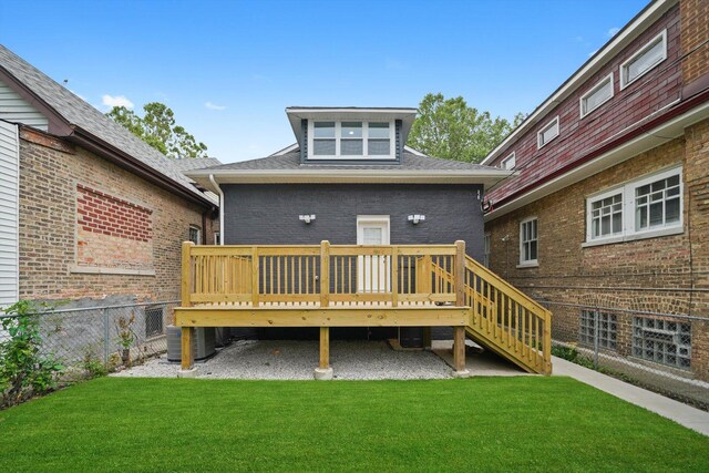 5426 N Bernard St, Chicago, IL 60625 - rear view of property featuring a deck, roof with shingles, brick siding, and stairs