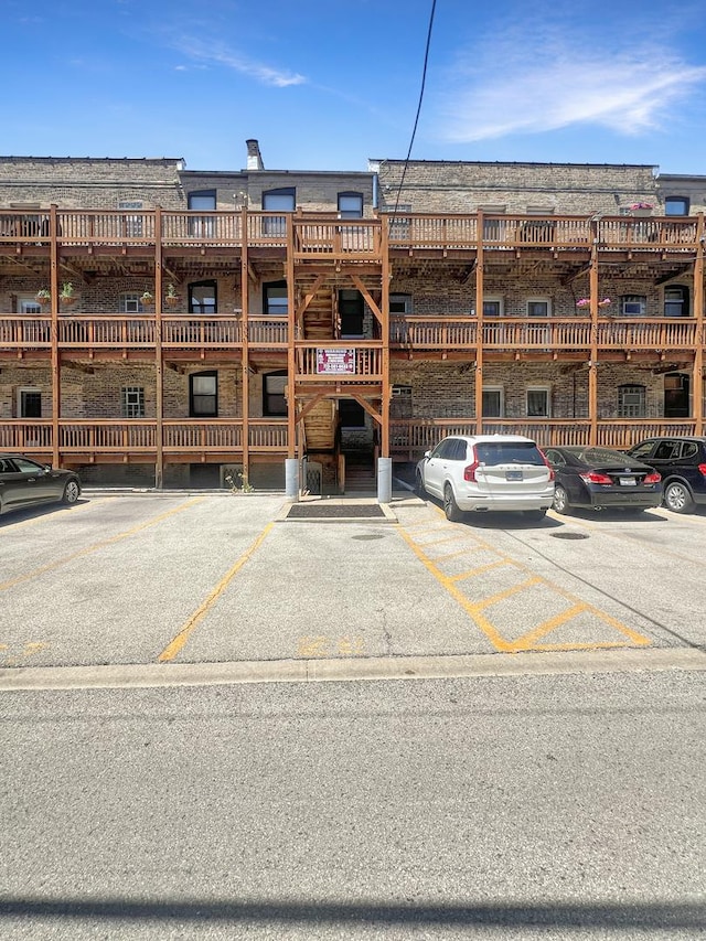 4023 N Southport Ave Unit 1, Chicago, IL 60613 - view of property featuring uncovered parking