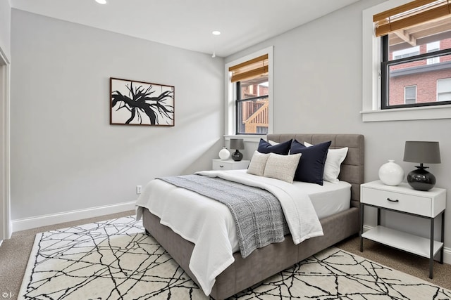 4023 N Southport Ave Unit 1, Chicago, IL 60613 - bedroom with light colored carpet, multiple windows, and recessed lighting