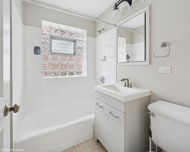 4023 N Southport Ave Unit 1, Chicago, IL 60613 - bathroom with vanity,  shower combination, and tile patterned floors