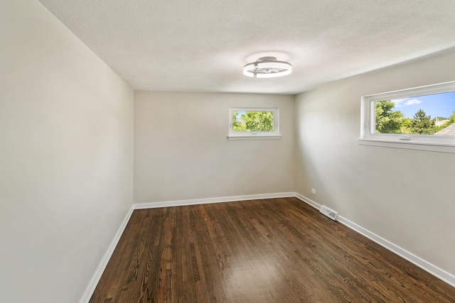 2637 W 93rd Pl, Evergreen Park, IL 60805 - empty room featuring dark wood-type flooring