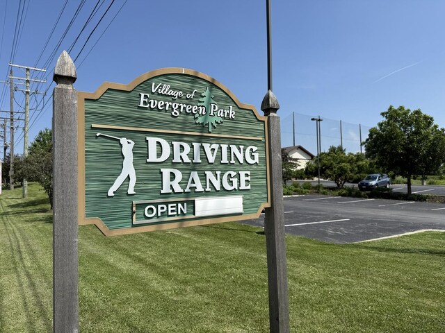 2637 W 93rd Pl, Evergreen Park, IL 60805 - community sign featuring uncovered parking and a yard