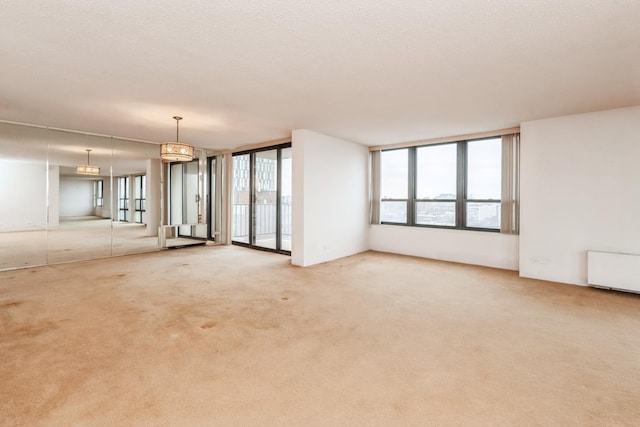 5471 S Hyde Park Blvd Unit 16Ab, Chicago, IL 60615 - unfurnished room with light carpet