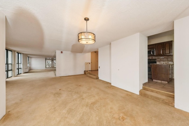 5471 S Hyde Park Blvd Unit 16Ab, Chicago, IL 60615 - unfurnished living room with light colored carpet