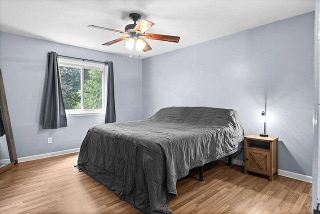 1106 Countryside Ln, Pontiac, IL 61764 - bedroom featuring light wood-style floors and ceiling fan