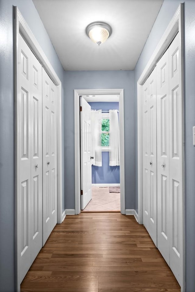 1106 Countryside Ln, Pontiac, IL 61764 - corridor featuring wood finished floors and baseboards