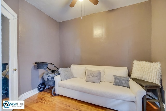 945 E Hyde Park Blvd Unit 2, Chicago, IL 60615 - living area featuring wood finished floors and a ceiling fan