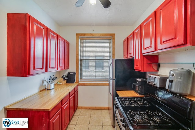 945 E Hyde Park Blvd Unit 2, Chicago, IL 60615 - kitchen featuring range with gas cooktop, reddish brown cabinets, and ceiling fan
