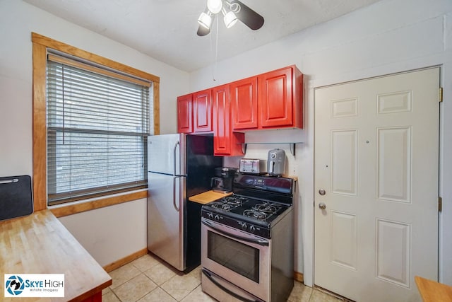 945 E Hyde Park Blvd Unit 2, Chicago, IL 60615 - kitchen with stainless steel appliances, a ceiling fan, dark brown cabinets, light countertops, and light tile patterned floors