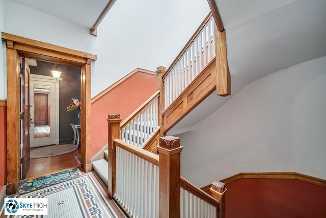 945 E Hyde Park Blvd Unit 2, Chicago, IL 60615 - stairs featuring wood finished floors and baseboards