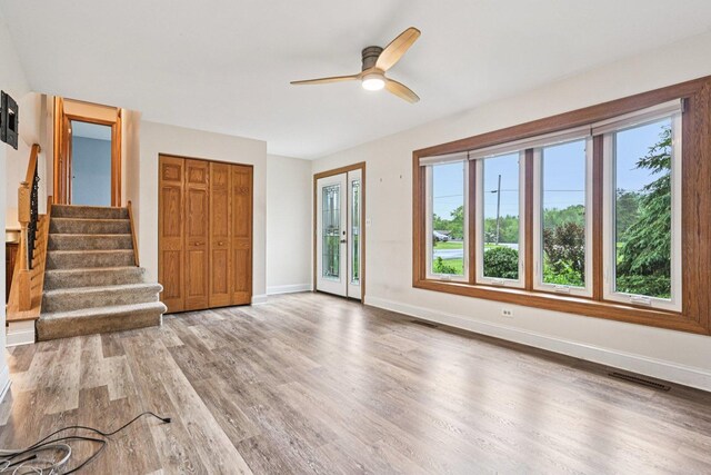 42280 N Center St, Antioch, IL 60002 - foyer entrance featuring healthy amount of natural light, a ceiling fan, wood finished floors, and stairway