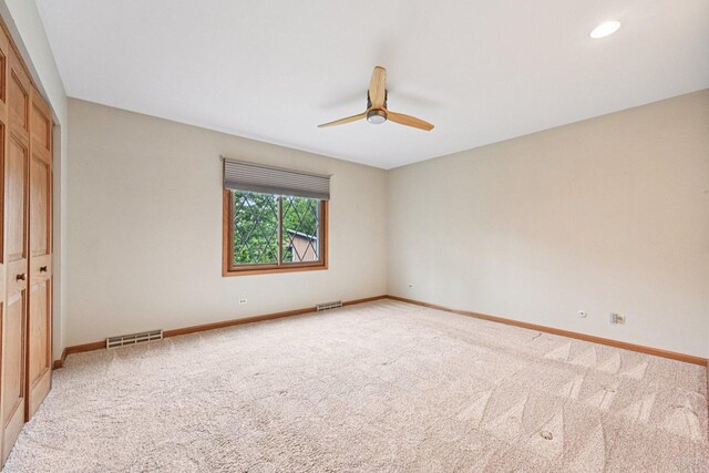 42280 N Center St, Antioch, IL 60002 - unfurnished bedroom featuring carpet floors, a closet, and ceiling fan