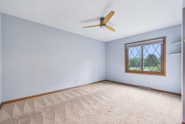 42280 N Center St, Antioch, IL 60002 - carpeted spare room featuring a ceiling fan and baseboards
