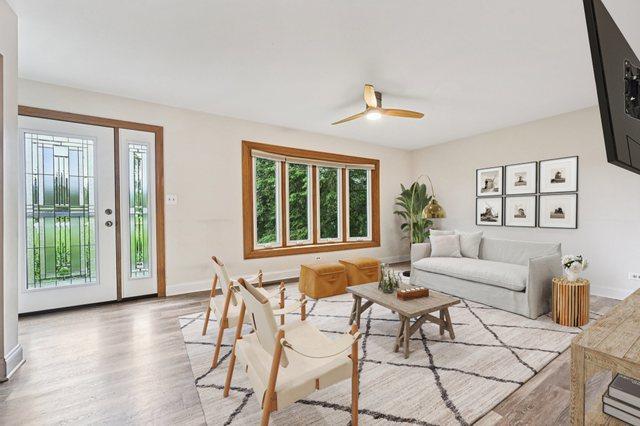 42280 N Center St, Antioch, IL 60002 - living area with wood finished floors and ceiling fan