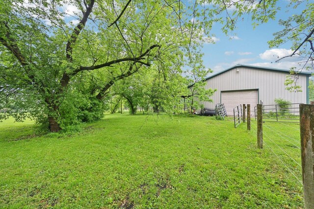 42280 N Center St, Antioch, IL 60002 - view of yard with a garage and an outbuilding