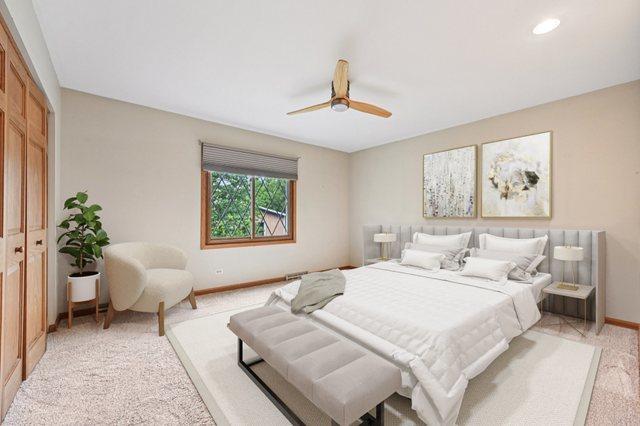 42280 N Center St, Antioch, IL 60002 - bedroom featuring light colored carpet, ceiling fan, and a closet