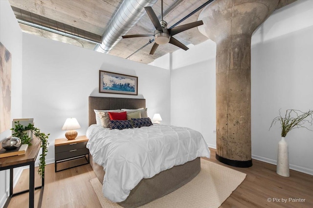 1550 S Blue Island Ave Unit 822, Chicago, IL 60608 - bedroom with wood finished floors and a ceiling fan