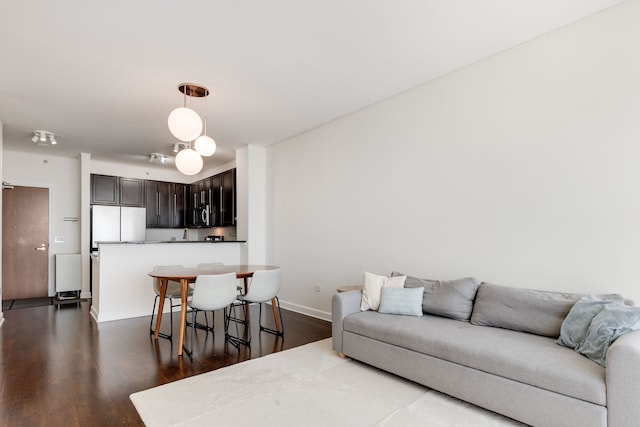 1901 S Calumet Ave Unit 2010, Chicago, IL 60616 - living area with dark wood-type flooring and baseboards