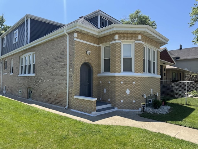 629 E 87th Pl, Chicago, IL 60619 - view of front of home with brick siding