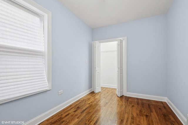629 E 87th Pl, Chicago, IL 60619 - spare room with wood finished floors and baseboards