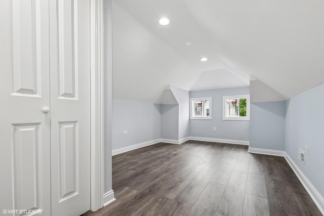 629 E 87th Pl, Chicago, IL 60619 - additional living space with dark wood-style floors, vaulted ceiling, and recessed lighting
