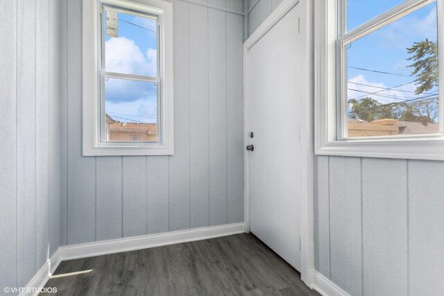629 E 87th Pl, Chicago, IL 60619 - spare room featuring dark wood-style floors and baseboards