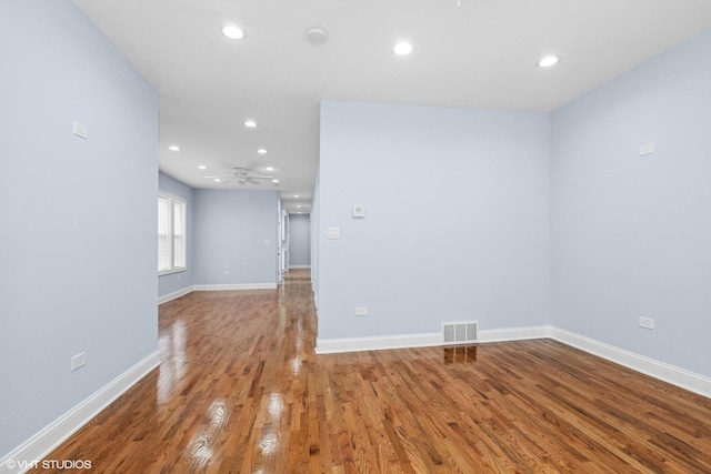 629 E 87th Pl, Chicago, IL 60619 - empty room featuring recessed lighting, wood finished floors, a ceiling fan, and a smoke detector