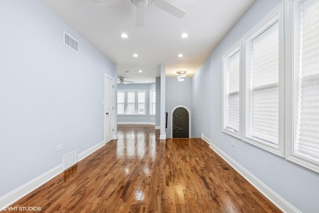 629 E 87th Pl, Chicago, IL 60619 - unfurnished living room with ceiling fan, recessed lighting, and wood finished floors